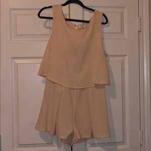 NUDE FLOWY ROMPER